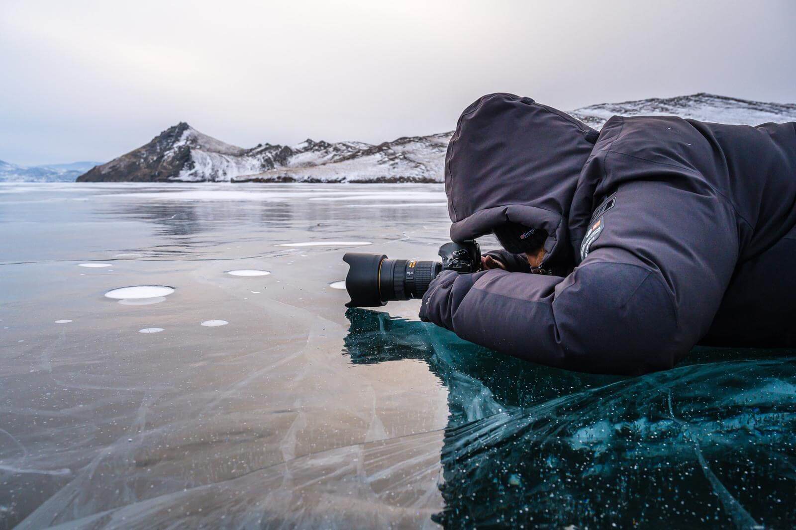 Sivani photographing the ice of Lake Baikal in Siberia.