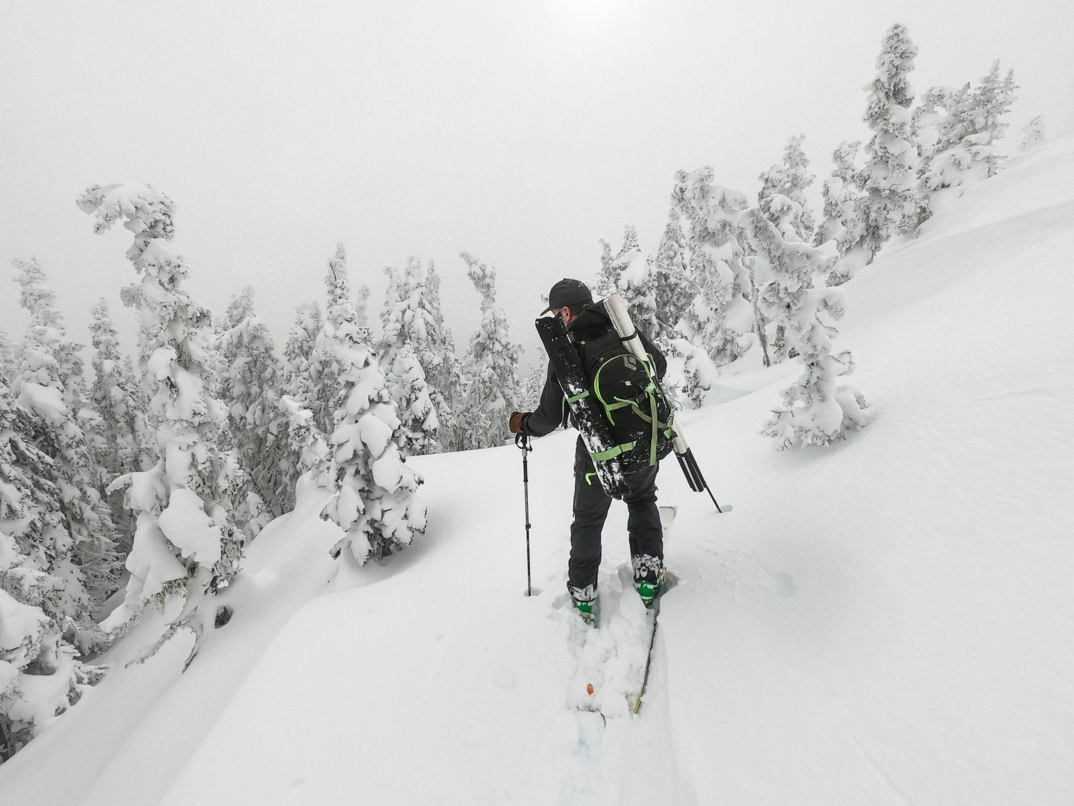 Loaded with gear to measure snowpack, research hydrologist Bill Floyd ventures into the British Columbia backcountry. Fieldwork is a perk of the job for this avid skier who otherwise spends his days in the lab or teaching geography at Vancouver Island University. Photo: Will McInnes.