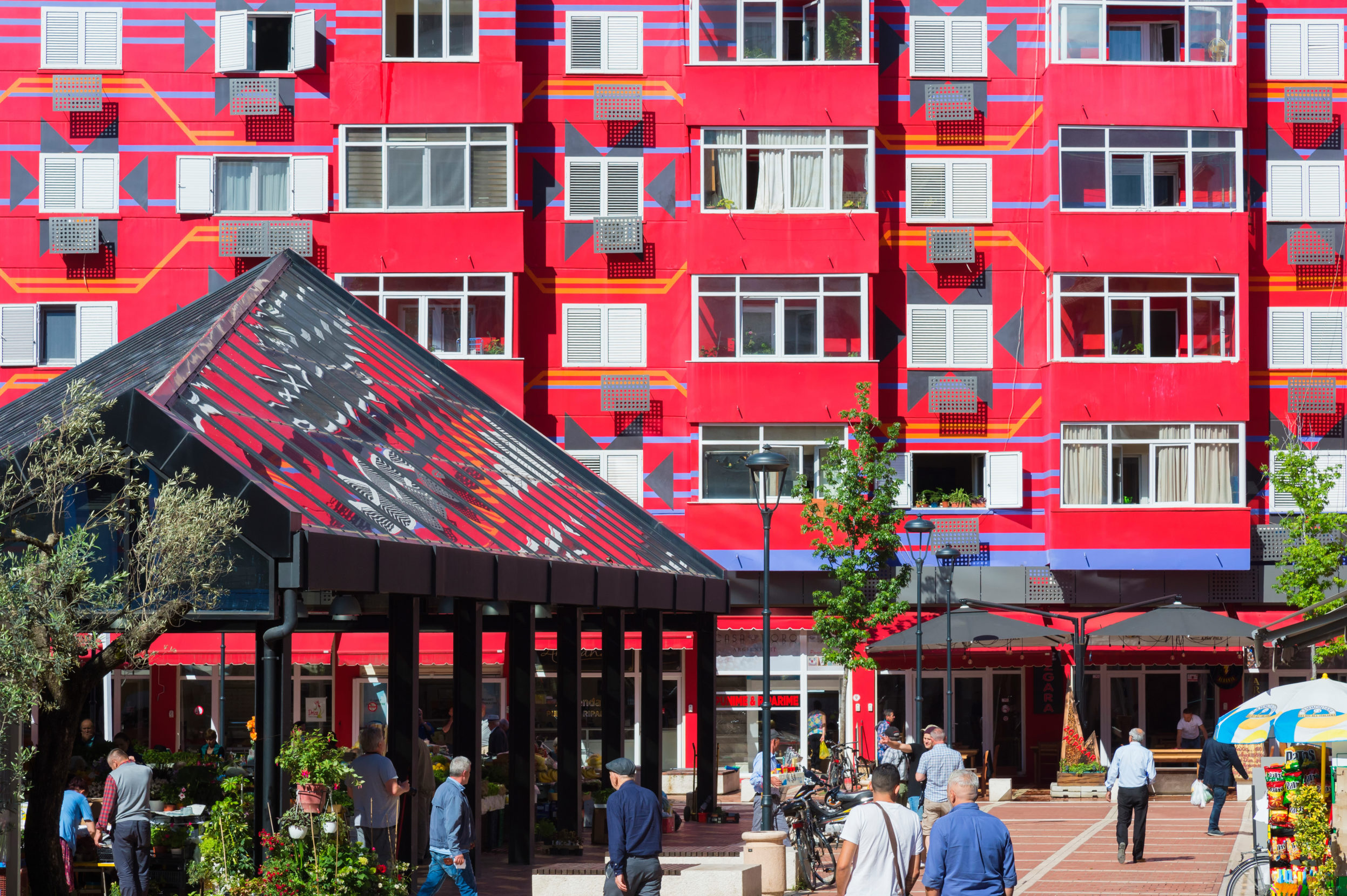 Brightly hued facades have become a hallmark of Tirana, Albania, ever since Edi Rama took the capital’s reins as mayor in 2000 and embarked on a painting campaign to rejuvenate communist-era buildings with color. Photo: Gabrielle/Adobe.