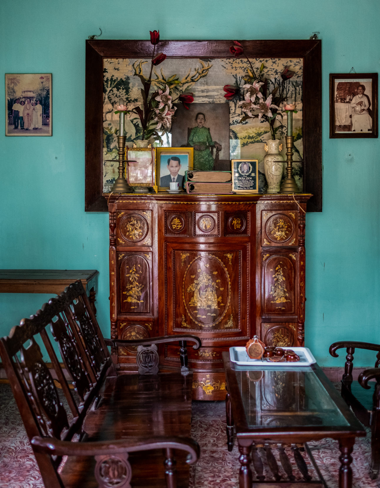 A portrait of the late Lê Thị Hoè takes pride of place inside the home she built in the early 1960s. Photo: Hiếu Trương Minh.