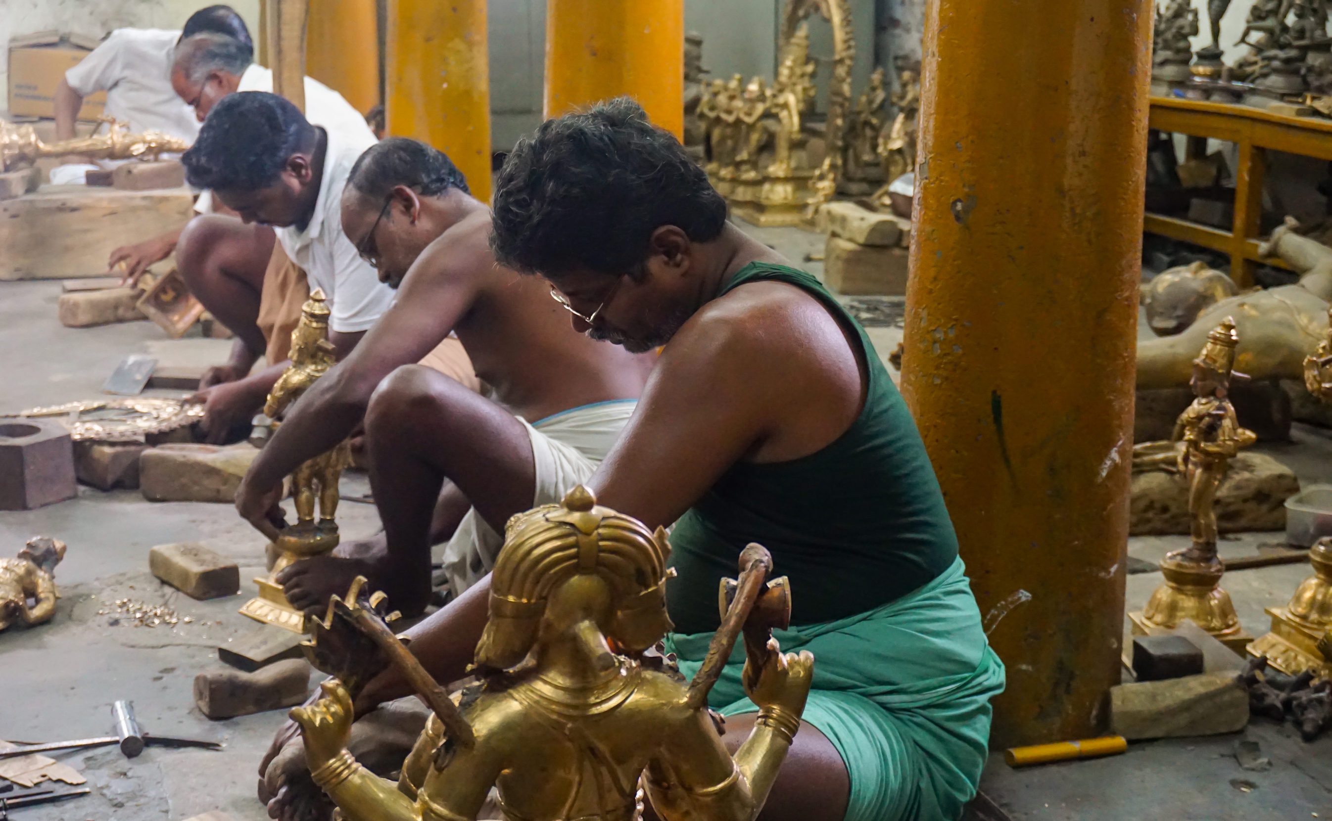 Working on the floor of a heritage foundry in Swamimalai, craftsmen cast panchaloha idols by hand and carry on the “lost wax” tradition mastered during the Chola empire. Photo: Meenakshi J.