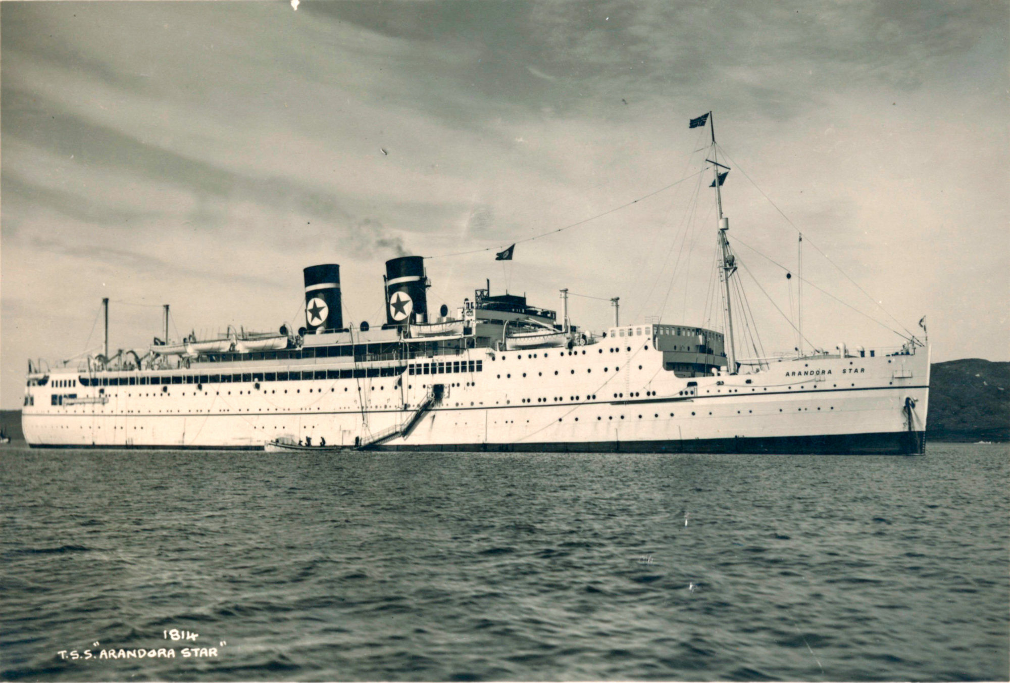 A black and white photo of the British passenger ship T.S.S. Arandora Star at sea.